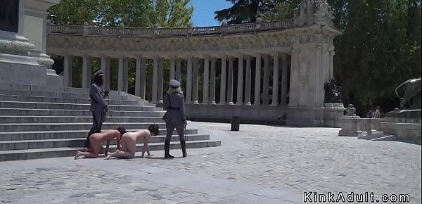  Two naked slave made to crawl in public